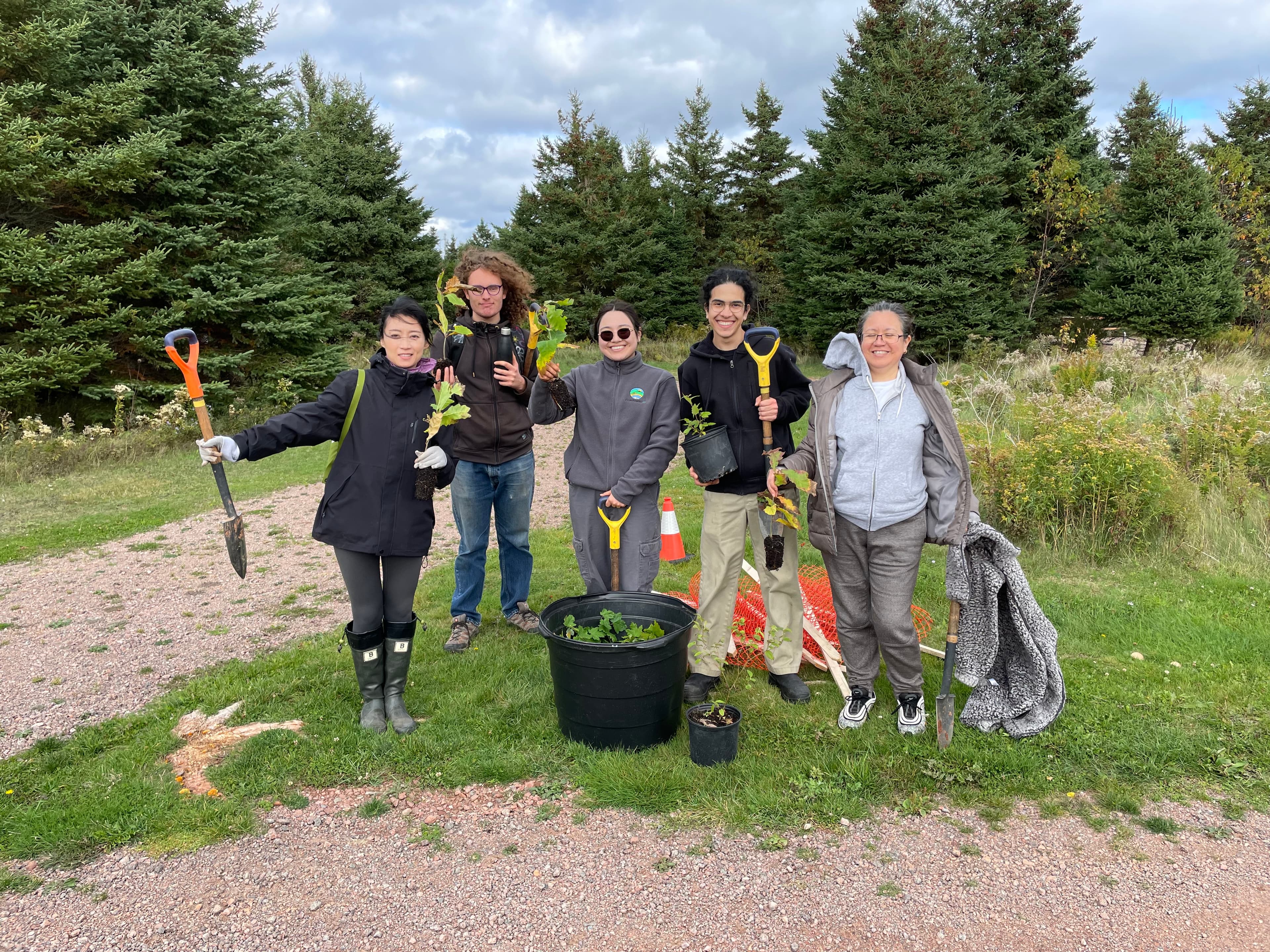 Jonathan and Team planting trees with the UPEI Climate Action Association