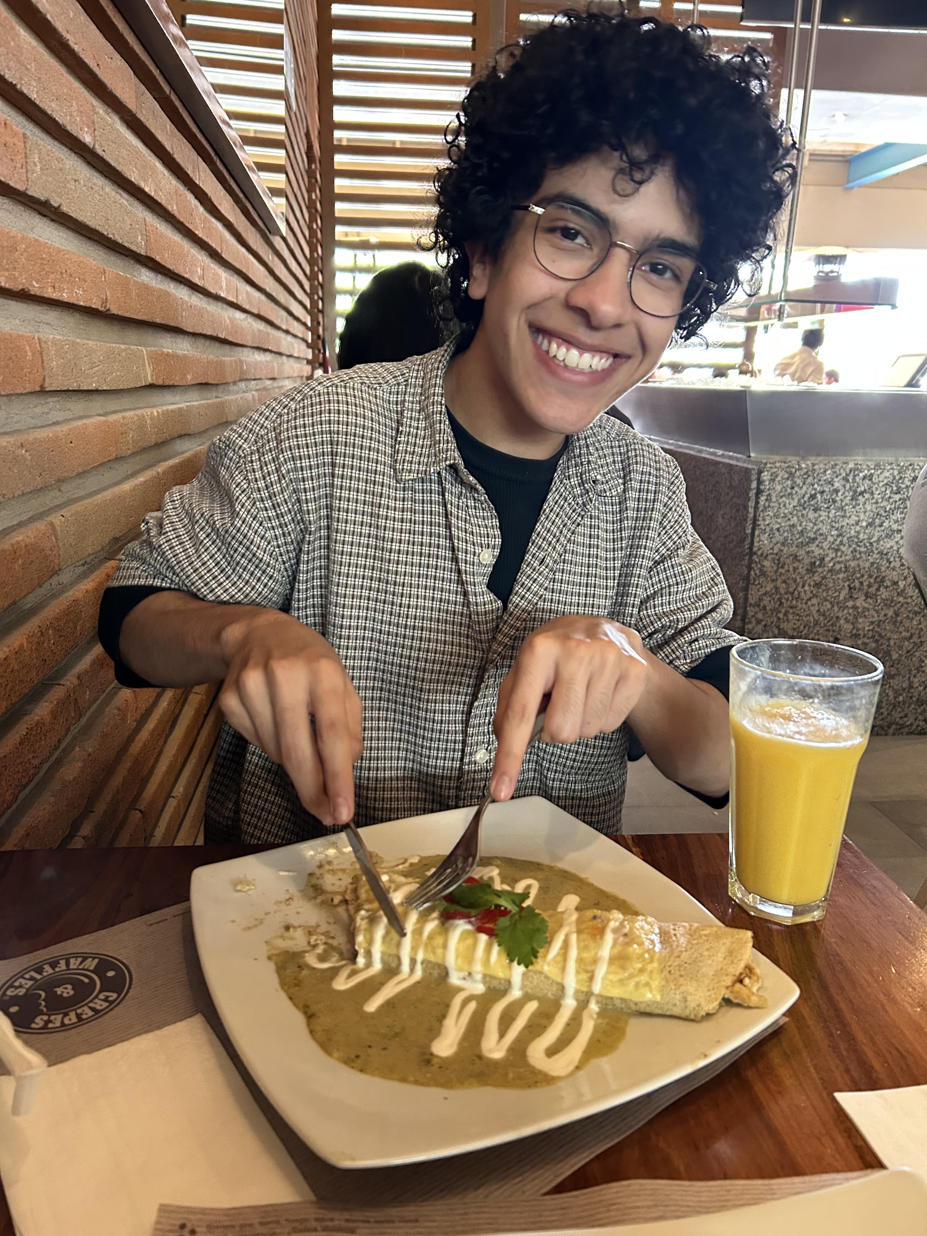 Jonathan eating enchiladas
